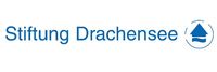 Namensschriftzug und blaues Haus in einem Kreis