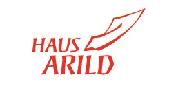 Namensschriftzug und ein wegwehendes Blatt Papier 